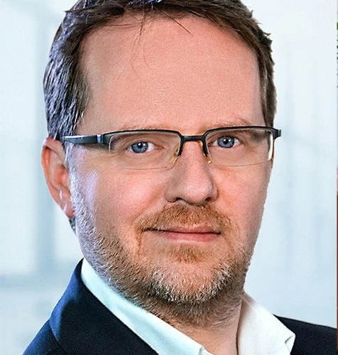 Prof. ANDREAS E. STEIERT