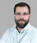 Проф. Николас Жирард